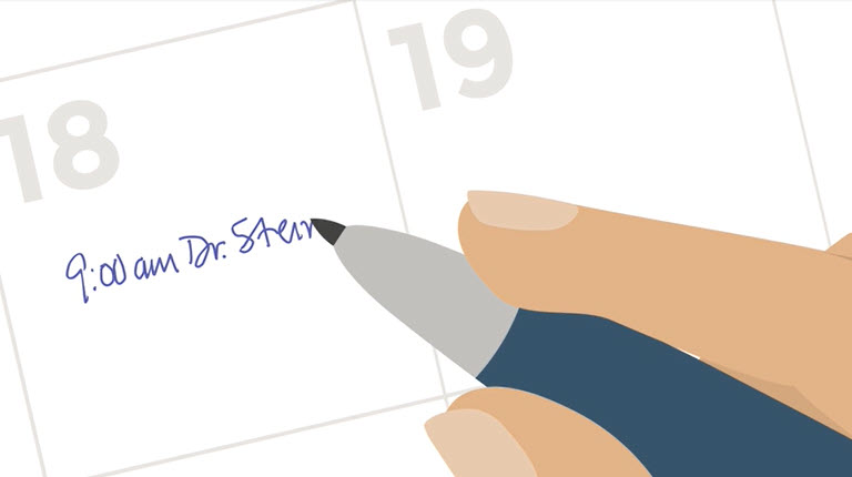 hand writing an appointment on a calendar
